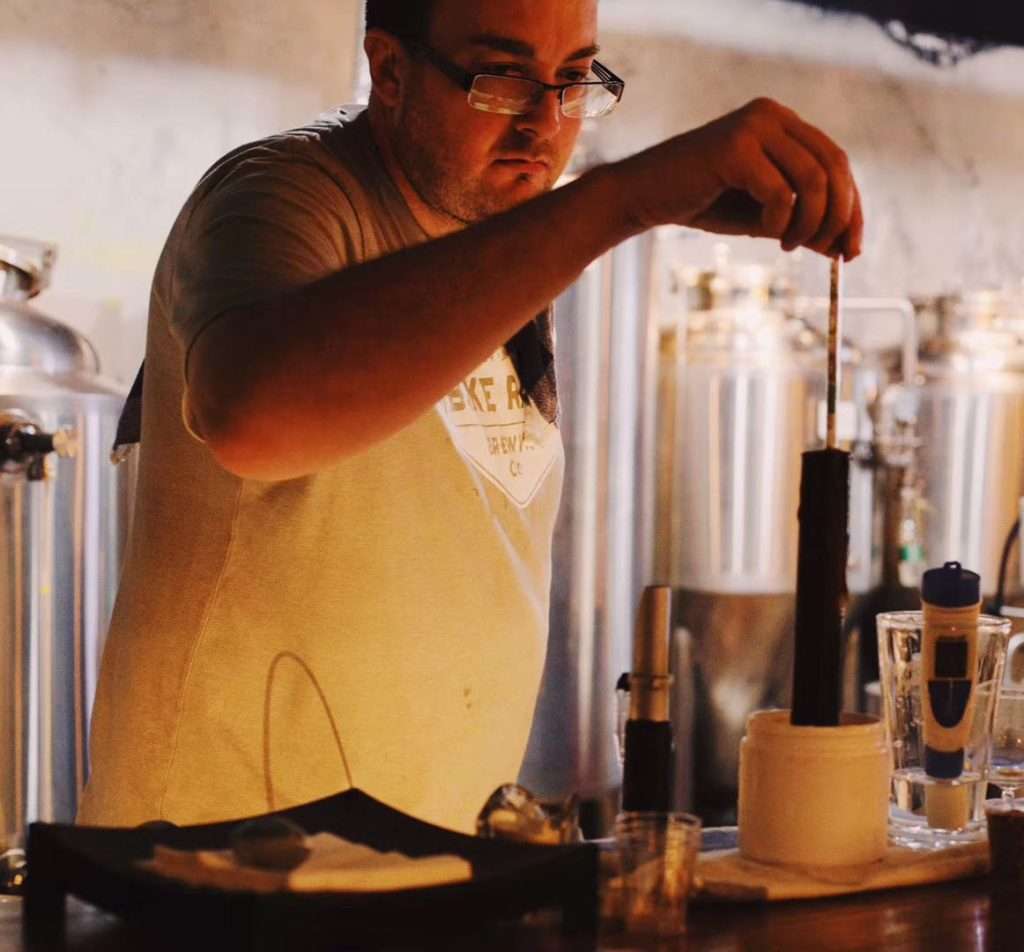 TJ Checking A Beer Gravity Use